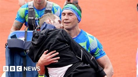 Kevin Sinfield carries Rob Burrow over Leeds marathon finish - Pakistan ...