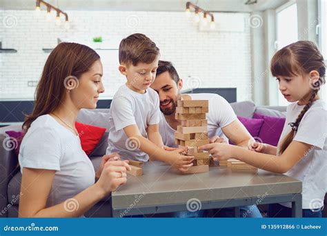 Happy Family Playing Board Games at Home. Stock Photo - Image of play ...