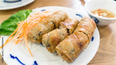 Vietnamese fried spring rolls Cha Gio with fish dipping sauce. Stock ...