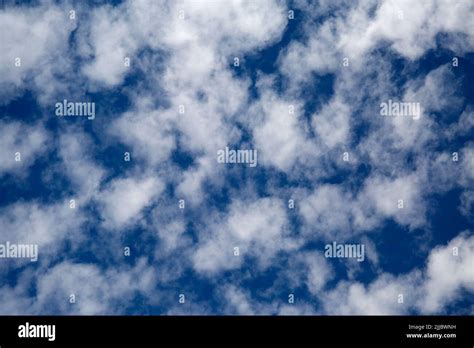 Altocumulus Castellanus Fair Weather Clouds in Blue Sky Stock Photo - Alamy