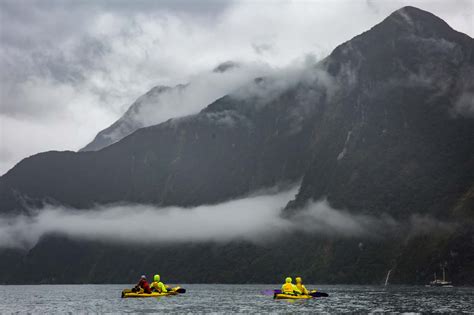 Kayaking Milford Sound in the pouring rain - Young Adventuress