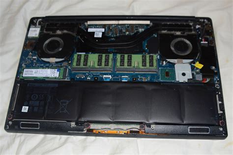 Solved: XPS 15 9560 , Battery swollen to point of hardware failure ...