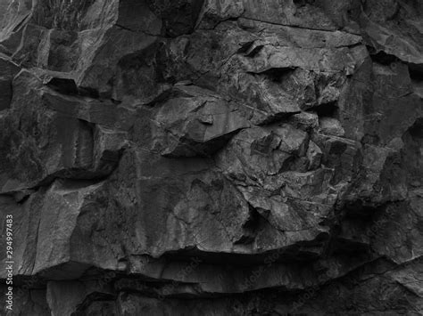 Rock texture. Dark black grunge stone texture background. Fragment of a ...