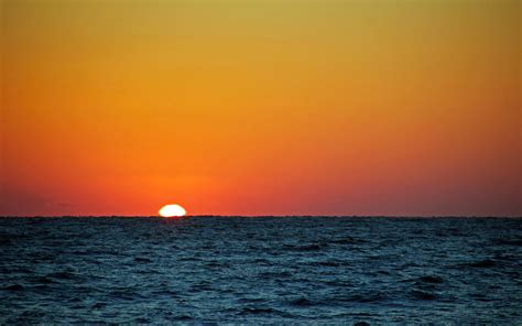 Sunrise over the Sea - Wallpaper (1680x1050) by TheBlakeSpace on DeviantArt