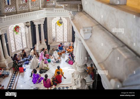 Group of people praying, in ISKCON temple, Sri Krishna Balaram Mandir ...