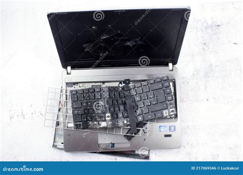 The Laptop is Smashed To Pieces. the Screen is Cracked, the Keyboard is ...