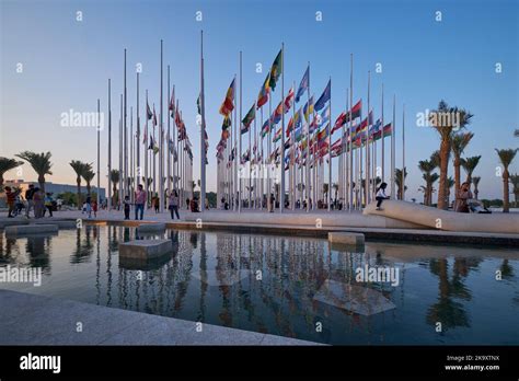 Doha corniche sunset view showing flags of the participating countries ...