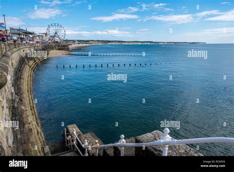 bridlington seafront with the ferris wheel at the far end Stock Photo ...