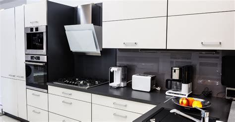 12 White Kitchen Cabinets with Black Countertops Designs