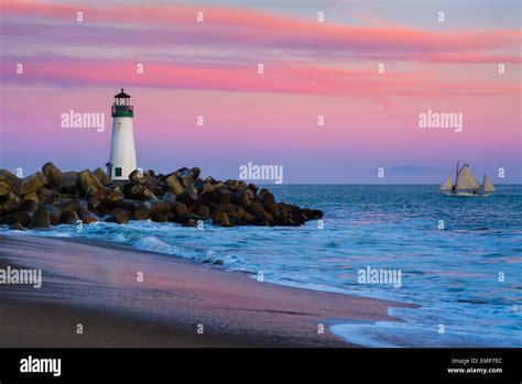 Santa Cruz Breakwater Lighthouse in Santa Cruz, California at sunset ...