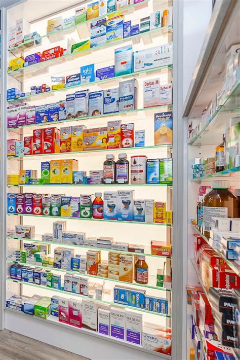 Pharmacy Shelving Design | Backlit Shelves | Contrast Interiors in 2021 ...