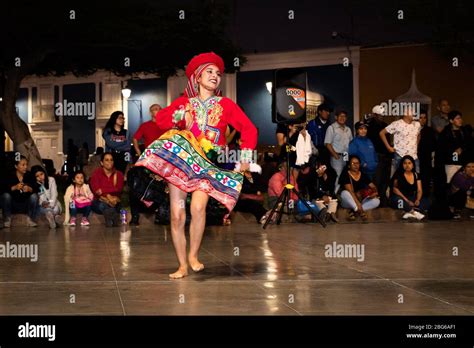 Dancers in colourful costumes performing traditional Huayno Cusqueño ...