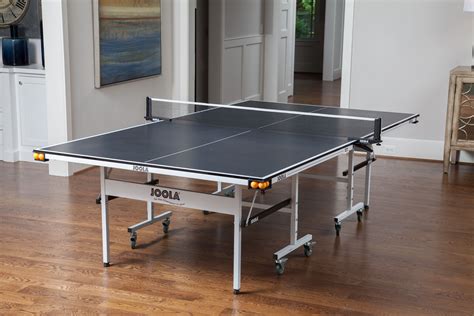 The JOOLA Rapidplay 150 Table Tennis Table features a 15mm features 4 ...