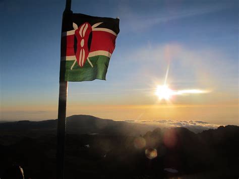 The top of Mount Kenya at sunrise | Kenyan flag, African tour, Mount kenya