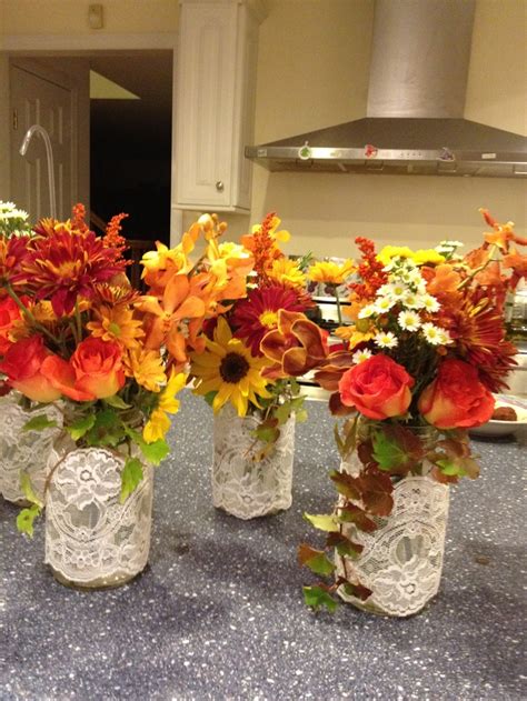 Mason jar centerpiece with fall colors and lace | Rustic | Pinterest ...