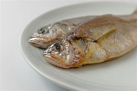 Dried Yellow Croaker on a White Background Stock Photo - Image of ...