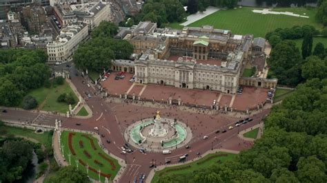 Approach Buckingham Palace with tourists, London England Aerial Stock ...