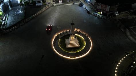 Time lapse of aerial night view of Tugu Jogja or Yogyakarta Monument ...