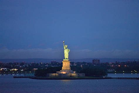 Royalty Free Statue Of Liberty At Night Pictures, Images and Stock ...