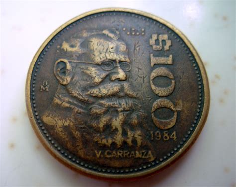 Mexican 100 pesos coin - front | The writing on this side sa… | Flickr