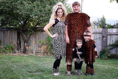 A Family Wearing Cavemen Costumes | Caveman costume, Family halloween ...