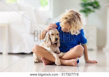 Child Playing Dog. Image & Photo (Free Trial) | Bigstock