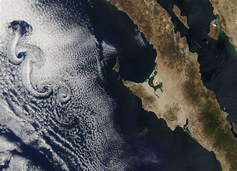 Rare 'Karman Vortex' spiral clouds spotted off coast of Baja California ...