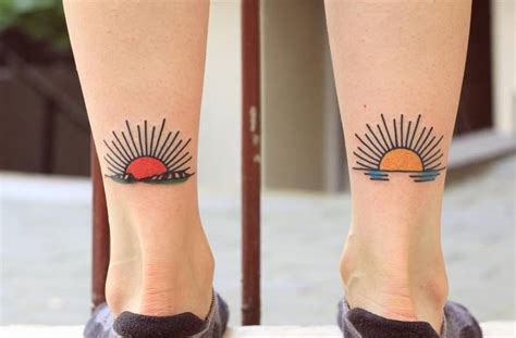 Two little matching sunset tattoos.