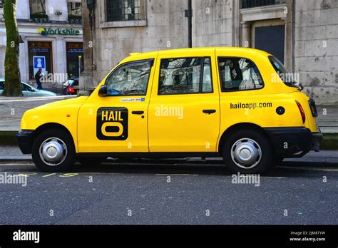 London yellow taxi cab Stock Photo - Alamy