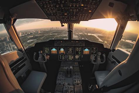 Cockpit of modern passenger jet aircraft. Pilots at work. Aerial view ...