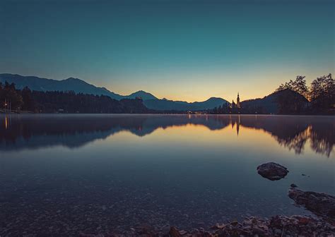 Lake Bled at Sunrise Photograph by Erich Krummer - Pixels