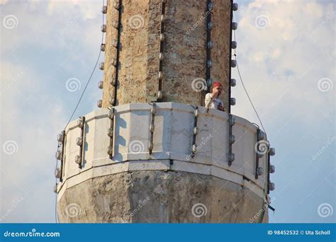 A Muezzin Singing His Prayer on a Minaret. Editorial Photography ...