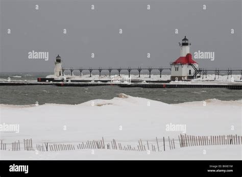 Silver Beach; St Joseph North Pier Lights on Lake Michigan; Winter ...