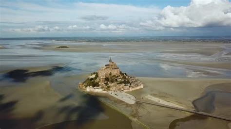 Aerial Drone view of Le Mont Saint Michel, iconic island and monastery ...