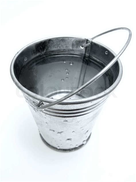 The metallic bucket full of water | Stock image | Colourbox