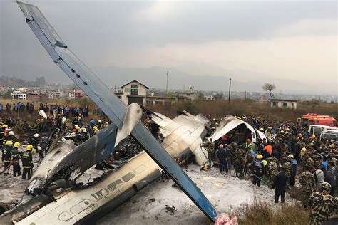 Passenger plane catches fire after crash landing at Kathmandu airport