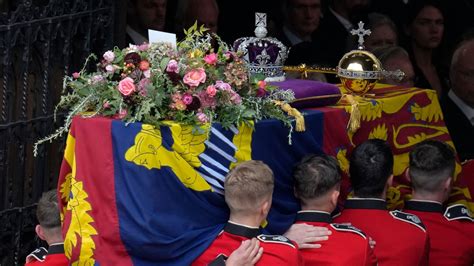 Queen Elizabeth II laid to rest at Windsor in private family burial ...