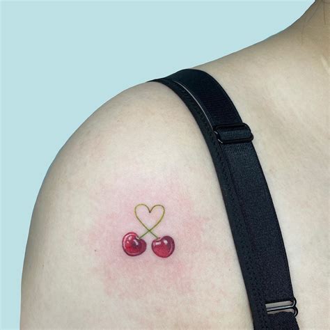 Creative Cherry Tattoo Designs Featuring Unique Fruit Imagery