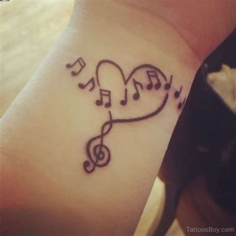 Love Heart And Music Notes Tattoos On Wrist | Tattoo Designs, Tattoo ...