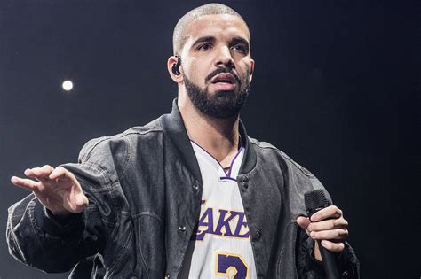 Drake reveals new giant owl chest tattoo