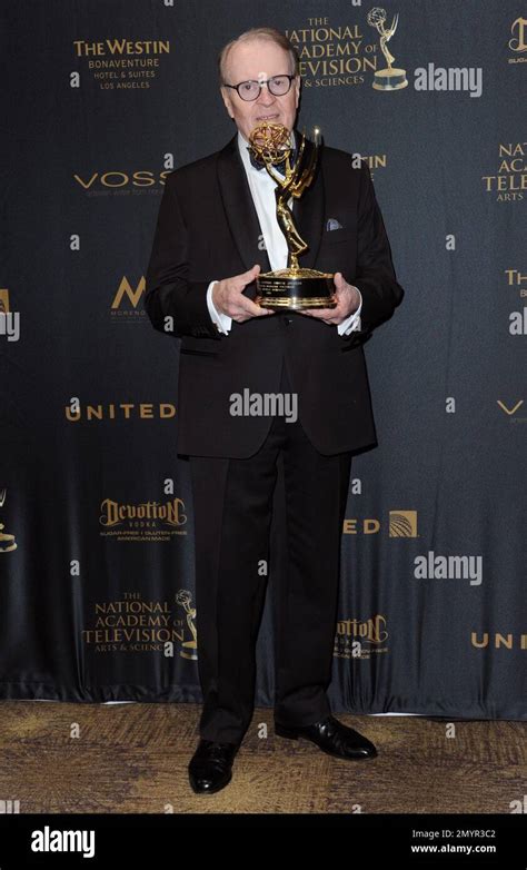 Charles Osgood poses in the pressroom with the award for outstanding ...