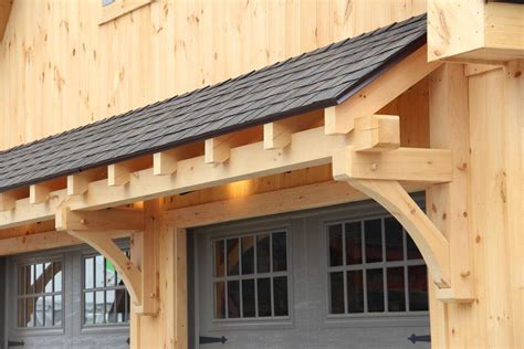 Timber frame eyebrow roof detail | Garage pergola, Timber frame porch ...