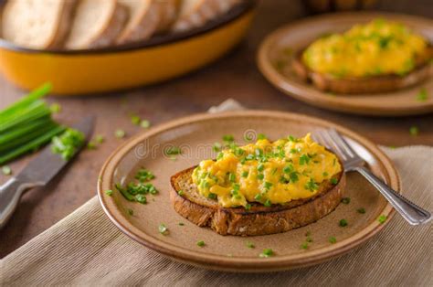 Scrambled eggs with herbs stock image. Image of dinner - 102884897