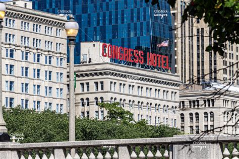 Original section of the Congress Plaza Hotel and its iconic red sign ...