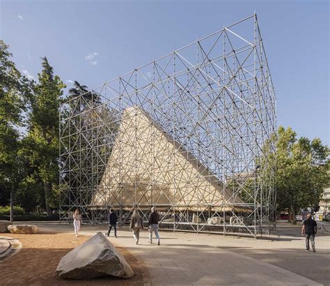 Aire Pavilion wrapped by giant scaffolding represents "unfinished ...