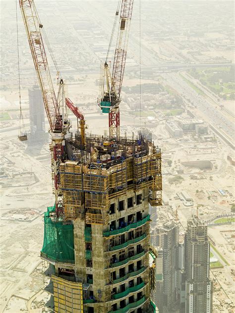 Burj Khalifa under construction Photograph by David Taylor-Bramley ...