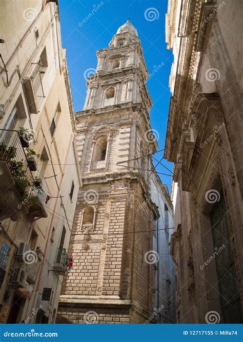 Belltower of Monopoli Cathedral. Apulia. Stock Image - Image of laundry ...