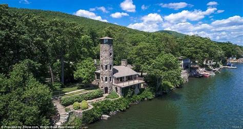 Surrounded by water: The house also has a boat house and lake-side ...