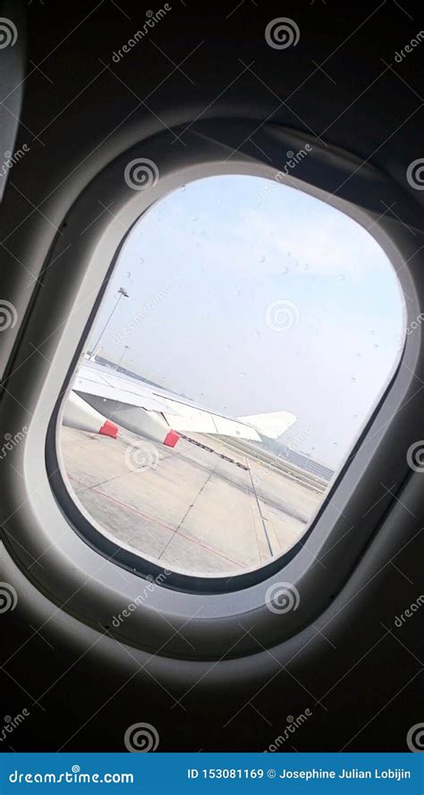 An Airplane Window Seat with Beautiful View of Wing of Plane on Flight ...