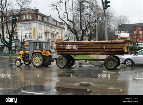 Ursus C 330 tractor pulling a trailer of logs Poland Stock Photo - Alamy